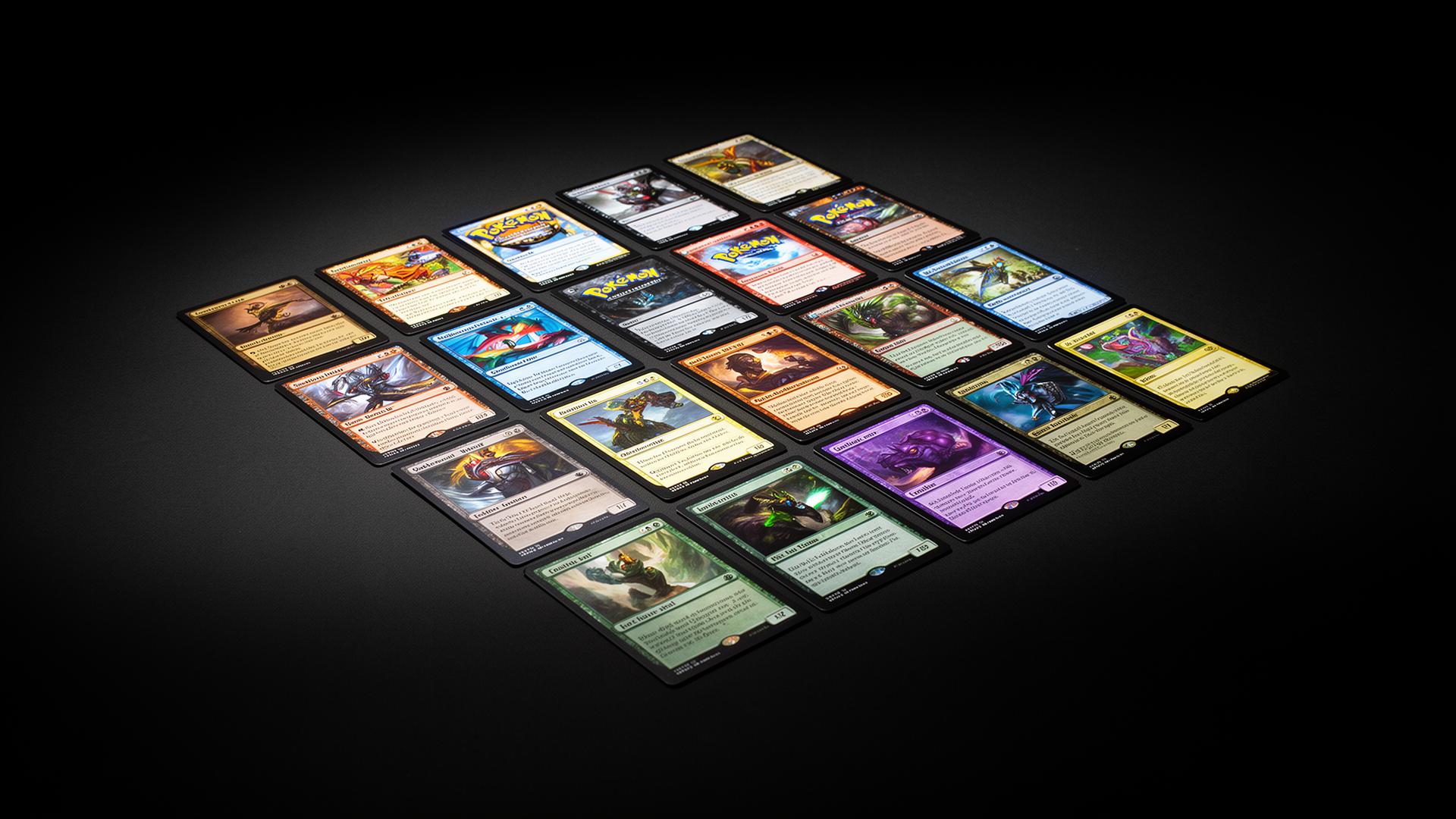 Trading cards arranged on dark surface